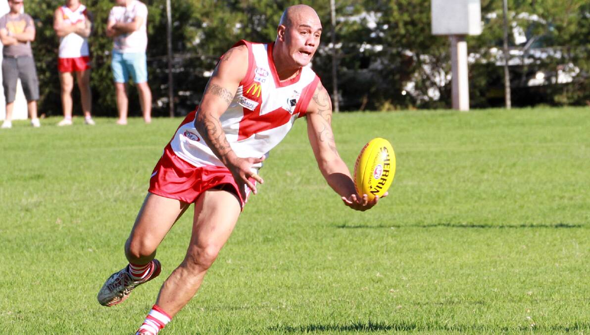 Former Yenda Blueheeler Lance Poka in his new strip playing for the Griffith Swans in Saturday's trial game at Exies.