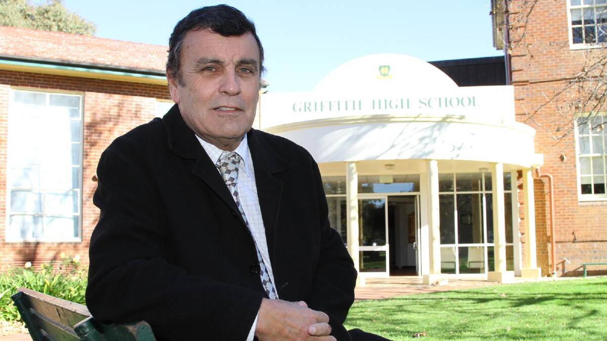 Griffith High School principal Charlie Cochrane is in the process of removing disgraced former sportsmaster Murray Jones from photos in the school’s foyer. 