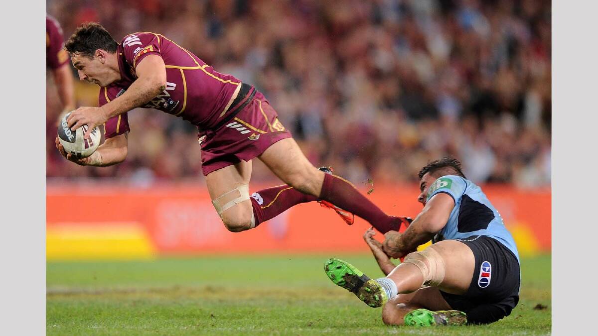 Andrew Fifita ... brings down one of Queensland's biggest weapons, Billy Slater, in game two. Picture: Getty Images
