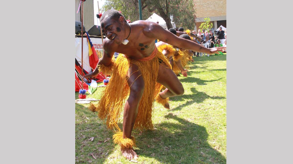 Fijian dancer Jolame Seduadua entertaining the crowds at Griffith's Multicultural Festival. Picture: Anthony Stipo