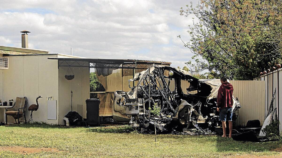 ALL GONE: A caravan was completely destroyed at Sidlow Road on Wednesday. Police are investigating the cause.   
