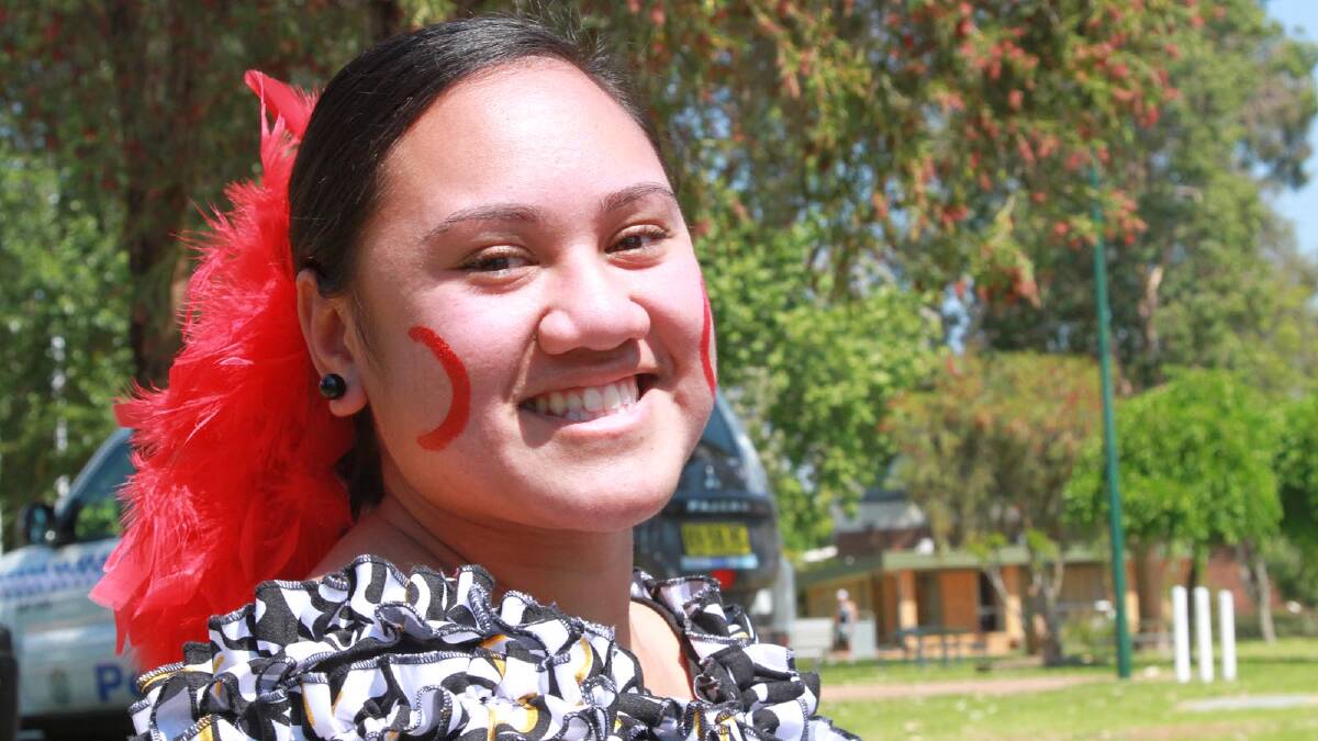 Isa Mapesone, 16, enjoying Griffith's Multicultural Festival. Picture: Anthony Stipo