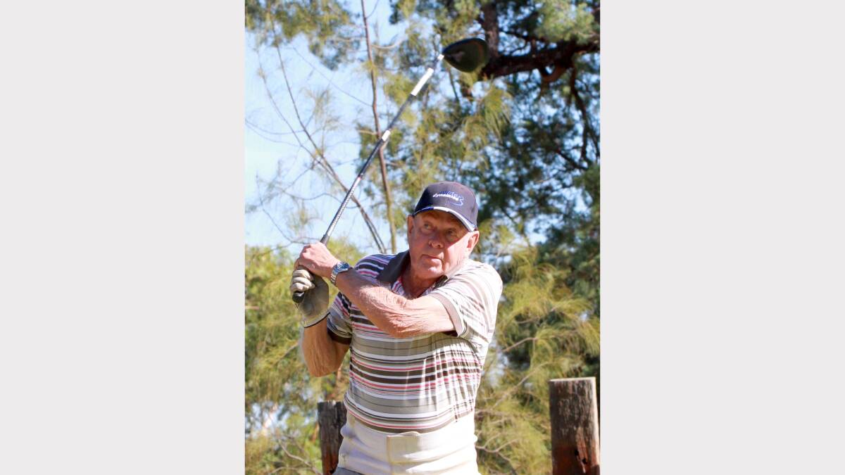Tom Morgan tees off at the Griffith Golf Course. Picture: Anthony Stipo