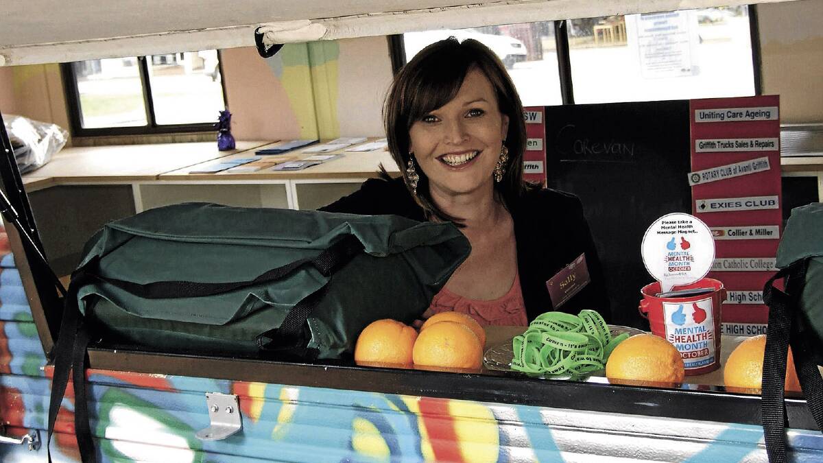 CARING: Raising awareness of poverty and homelessness in Memorial Park last Thursday with the Griffith Carevan is coordinator Sally Leach.