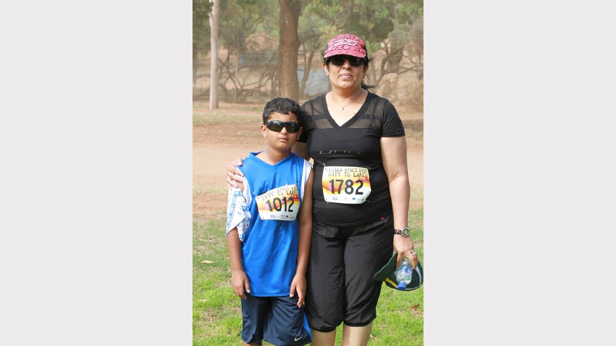 City to Lake fun run - Zain Memon, 7 with his mum Gulshan Ara. Picture: Anthony Stipo