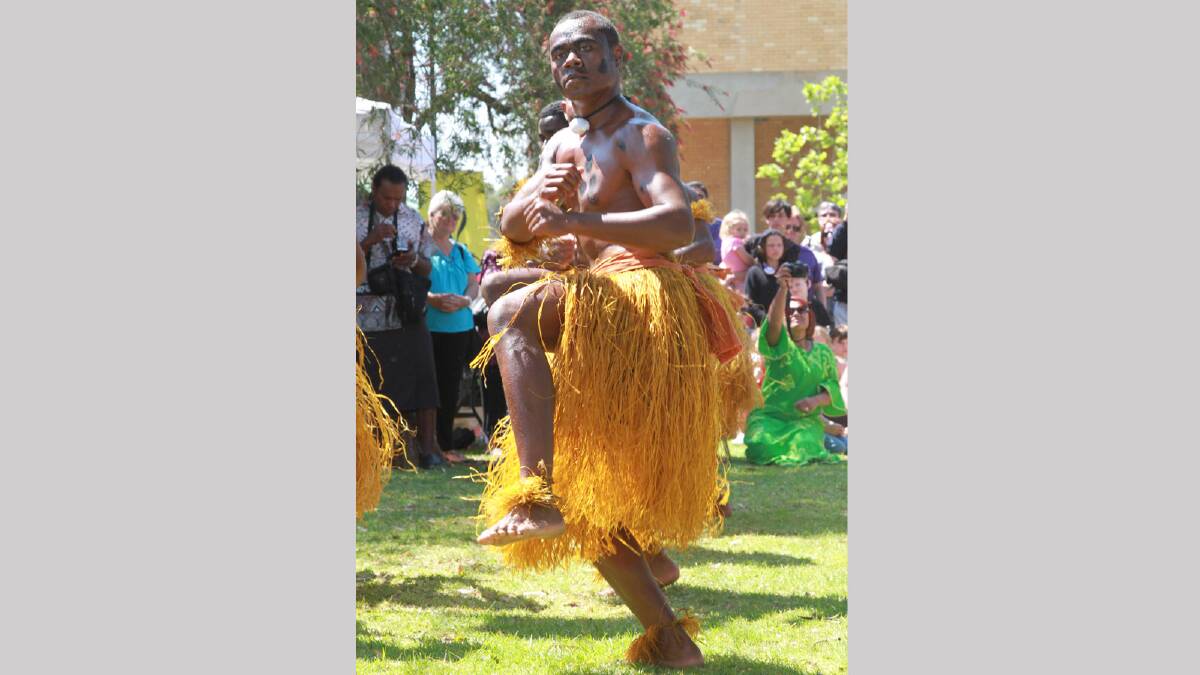 Fijian dancer Jolame Seduadua entertaining the crowds at Griffith's Multicultural Festival. Picture: Anthony StipoFijian dancer Jolame Seduadua entertaining the crowds at Griffith's Multicultural Festival. Picture: Anthony Stipo