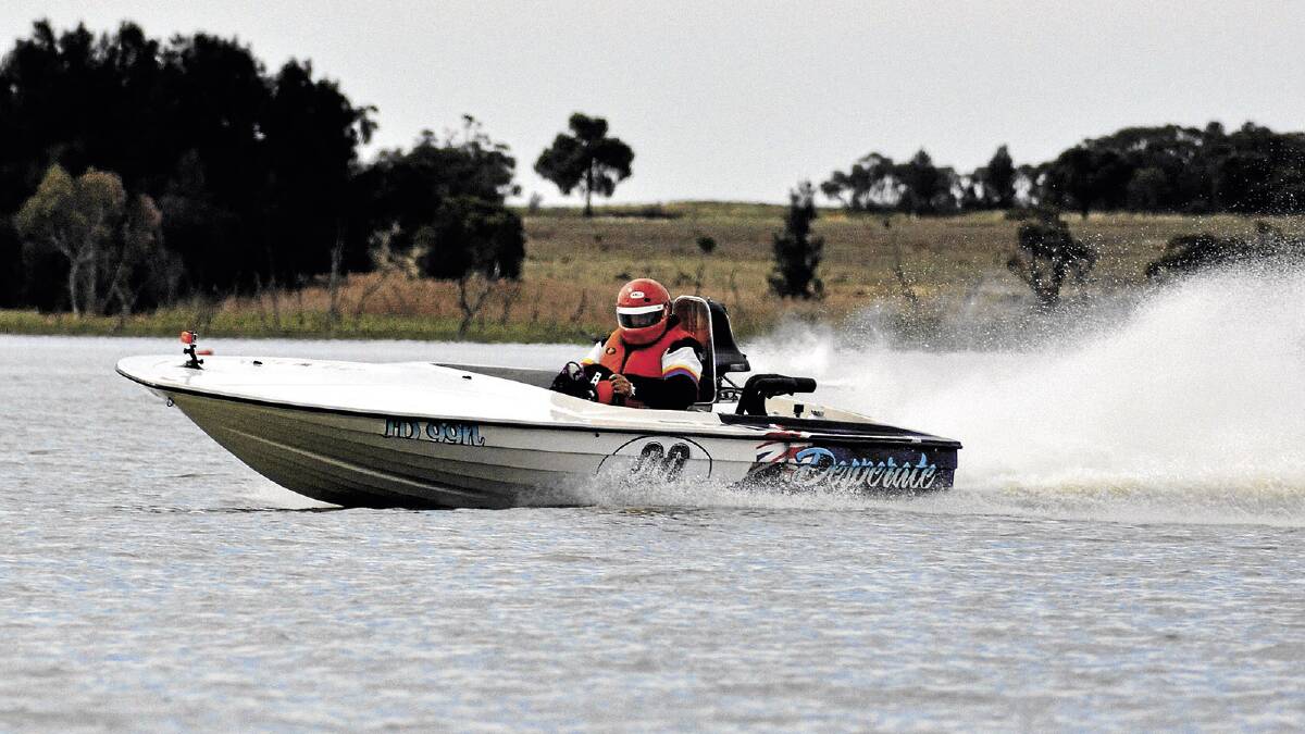 LAKE LAMPOONING: John Davoll on his boat, Desperate, races in the Prostock race at the APBA national titles on Saturday.