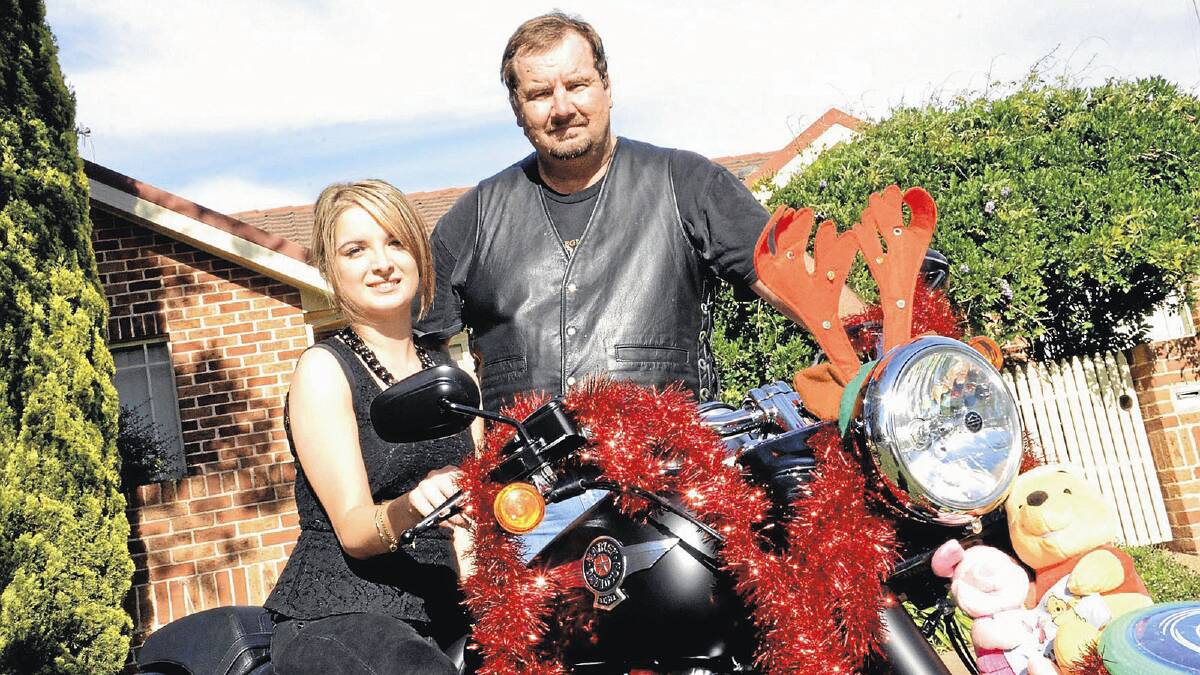SET TO RUN: Can Assist volunteer Kayla Reginato and Griffith Toy Run organising committee member Andrew McLean gear up for the annual event.
