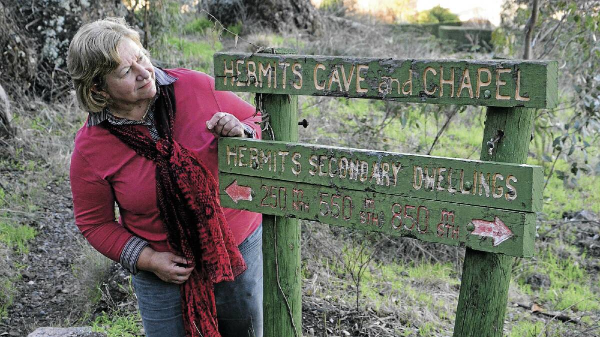 WHAT THE?: Hermit's Cave enthusiast Carmel La Rocca is calling for the precinct’s new signs to provide clearer directions and more information about the unique tourist attraction.