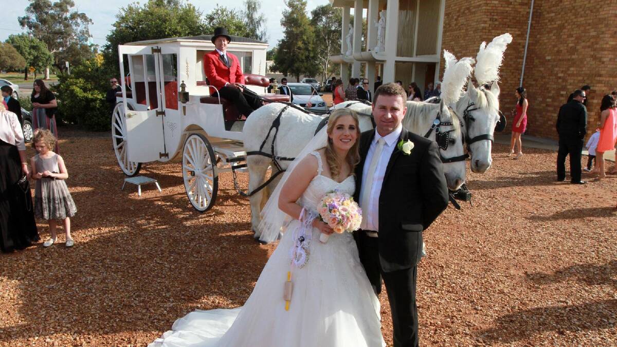 Just Married: Jill and Michael Rossetto married at St Therese Church in Yenda on the same day as the federal election. Picture: Anthony Stipo