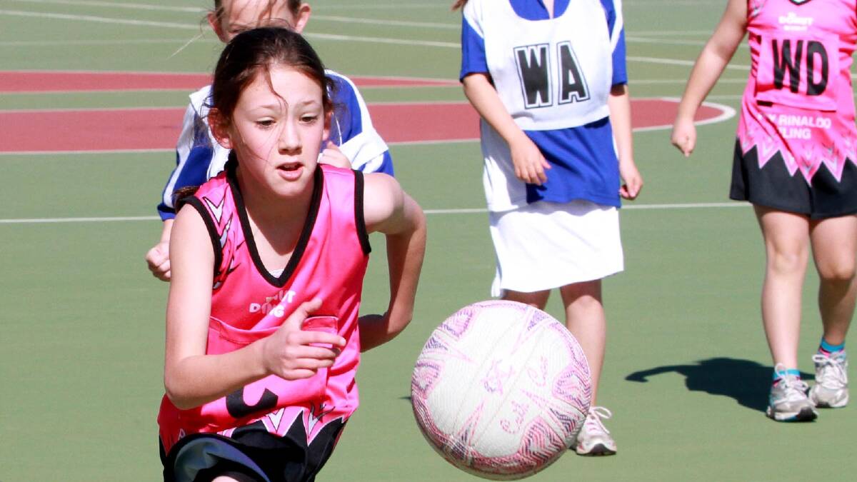 Isabella Salmon streaks across the court in the under 10s netball at Jubilee Oval. Picture: Anthony Stipo