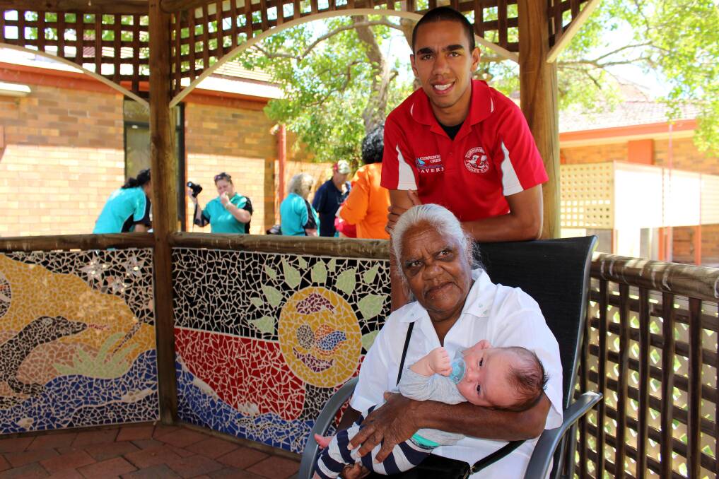 Proud dad Dwayne Broome, with his grandmother Aloma Penrith holding his son Jaxon Broome, five weeks, inside the refurbished pagola beside Griffith Base Hospital's maternity ward.