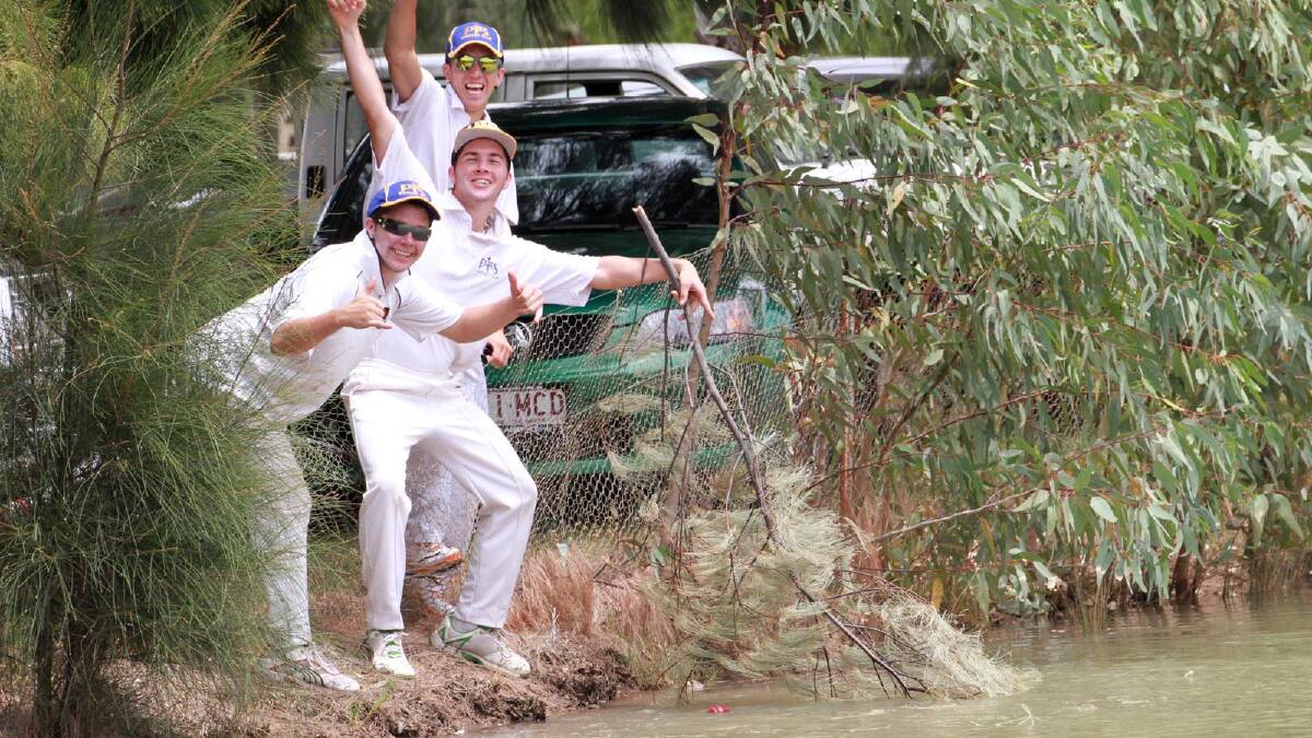 Exies A Grade cricketers Jamie and Justin Winkler and Theo Valeri have to retrieve the ball from the golf club dam during a match at Wade Park. Picture: Anthony Stipo