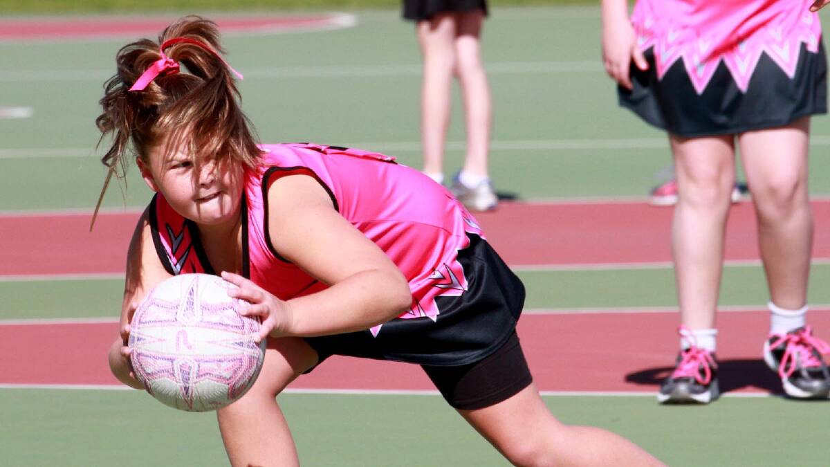 Alyss Quinn dons her game face for Lil Chicks at the under 10s netball. Picture: Anthony Stipo