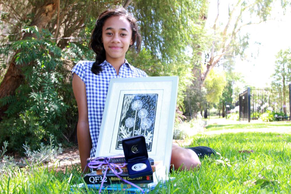 Griffith Public School student Mele Fifita, 12, has been awarded the Community Relations Commission (CRC) Dorothea Mackellar Poetry Award 2013 for her poem Australia Fair. Picture: Anthony Stipo