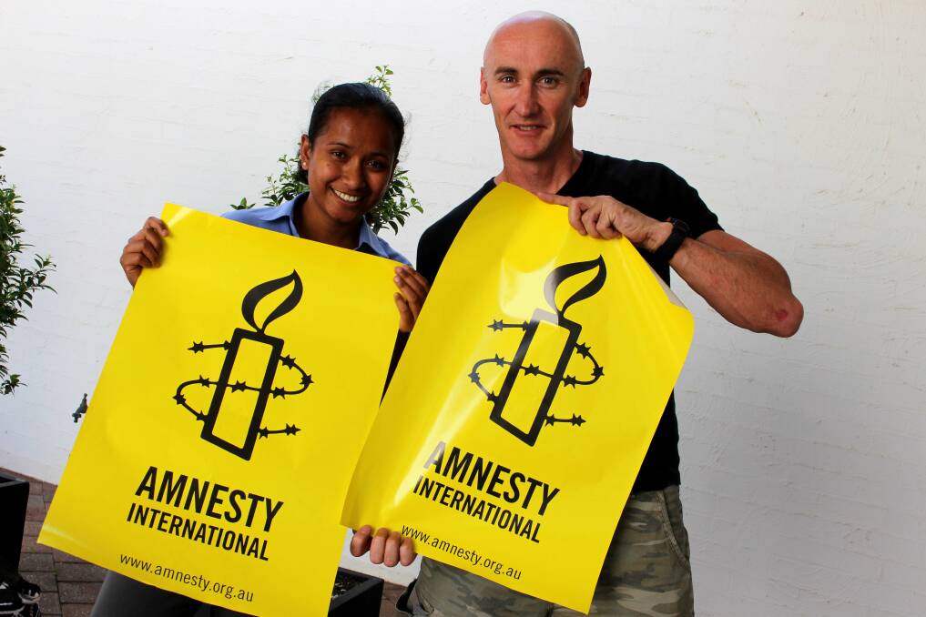 Griffith Amnesty International committee members Tanya Kassman and Brett Naseby hope locals will help them with their Write for Rights campaign this Saturday at Griffith Central.