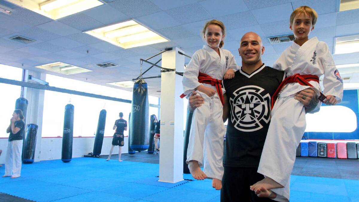 UFC fighter Branon Vera with Betheny Piva, 7, and William Piva, 8. Picture: Anthony Stipo