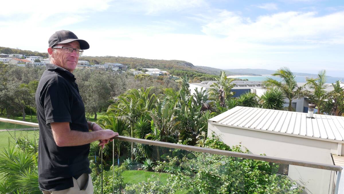 Peter Brannelly stands on the viewing platform that takes full advantage of property's ocean views. Photo: Ellouise Bailey