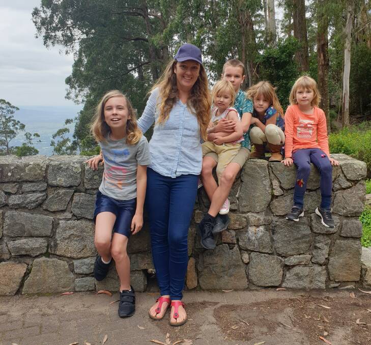 Sally and her five children on the day of her husband Tom's surgery. Photo: supplied 