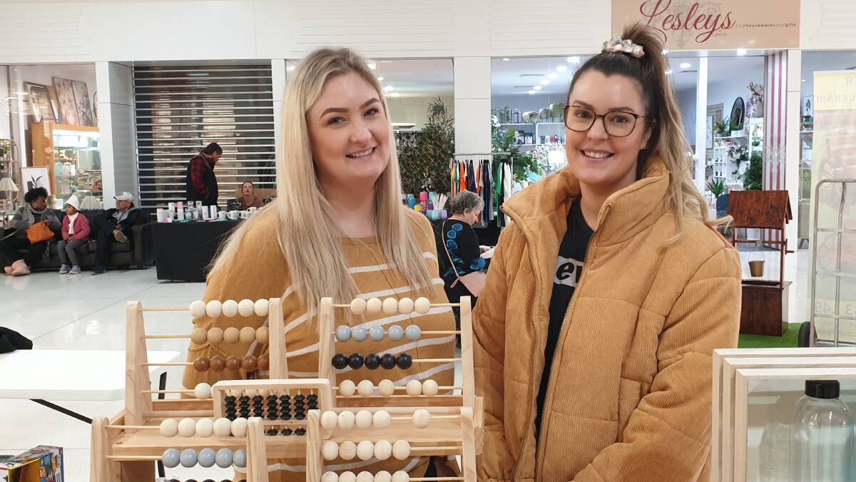 DYNAMIC DUO: Cat Earsman and Sam Smith partnered their two sensory business up together to run a stall at Griffith Central's market day. PHOTO: Cai Holroyd