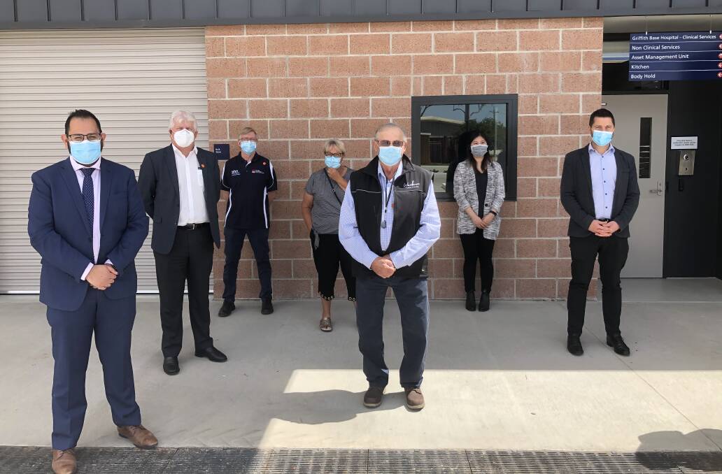 TOUR GROUP: Suchit Handa, Brett Stonestreet, Peter Sparks, Bruna Ross, Mayor John Dal Broi, Natalie Ong and Nicolas di Condio toured the new Non-Clinical Services building before it opens on Wednesday. PHOTO: Cai Holroyd