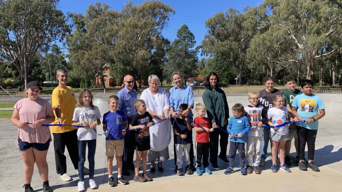 GROMMETS: Councillors, federal members and skaters came together to cut the ribbon of the brand new bowl at Darlington Point skate park. PHOTO: Cai Holroyd