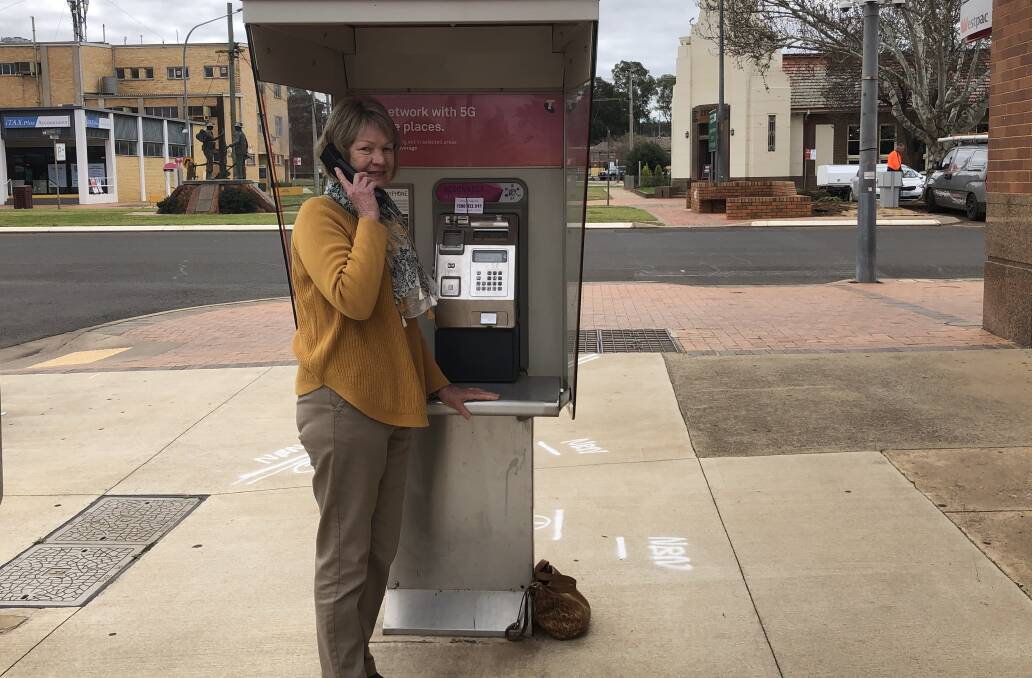 RING RING: Val Woodland is a volunteer with the Griffith Suicide Prevention and Support Group, and says the new free payphone plan could change lives. PHOTO: Cai Holroyd