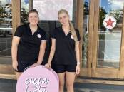 Molly Jackson and Grace Wallace are servers at Cocoa and Bean, and said they were doing frequent overtime to make up the staffing deficit. Picture by Cai Holroyd