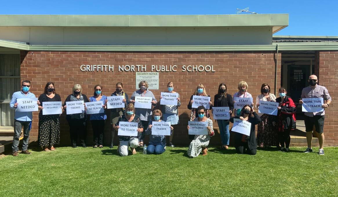 MORE THAN THANKS: Teachers at Griffith North Public School staged a quick stop-work to draw attention to the worsening shortage of teachers. PHOTO: Contributed
