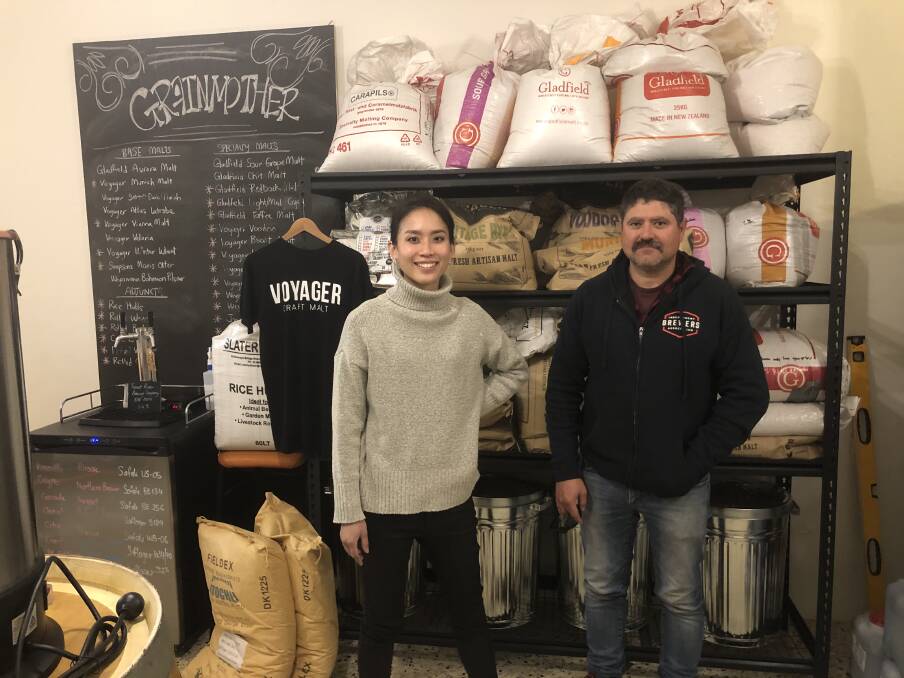 MALT: Megan Tai and Adam Gaffey in front of their 'malt shelf.' They have enough malts that there's 'no recipe they can't do.' PHOTO: Cai Holroyd