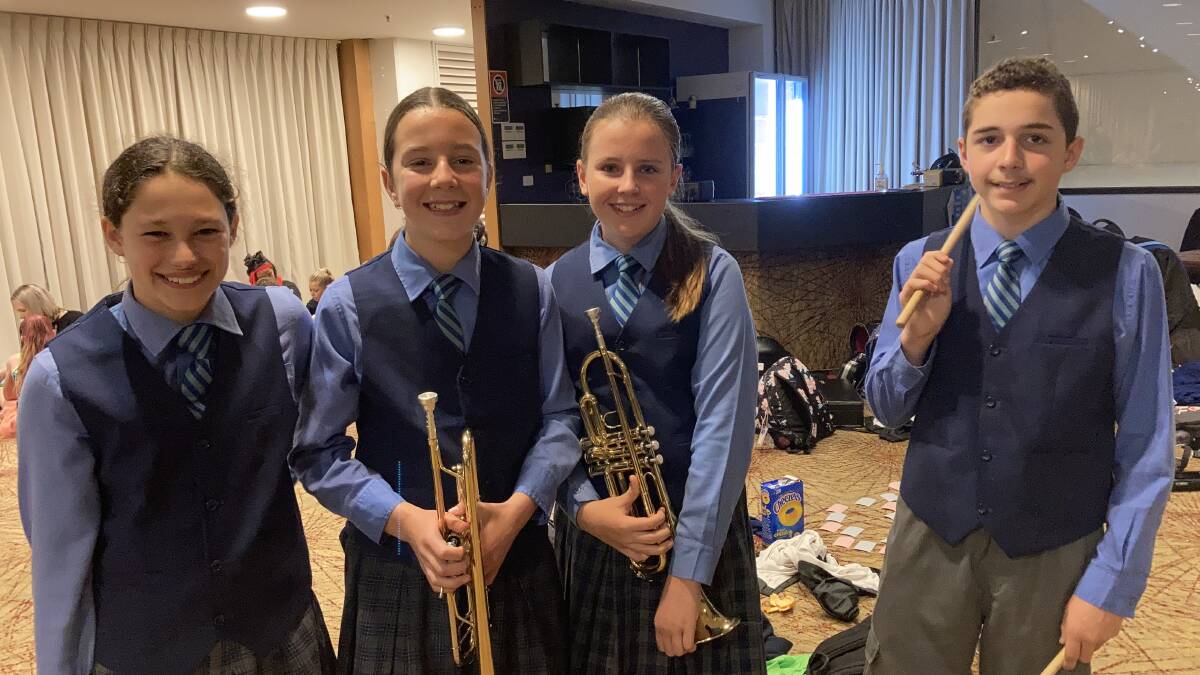 CREAM OF THE KROP: Rose Turner, Daisy O'Connor, Isabelle Fitzpatrick and Cooper Mesa from Griffith East Public School preparing for their performance. PHOTO: Cai Holroyd