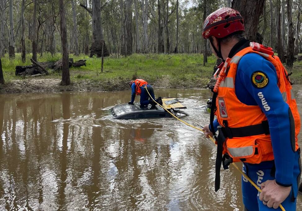 OPERATOR PLEASE: Anthony Hatch and Brad Palmer are two of Griffith SES's flood rescuers. PHOTO: Contributed