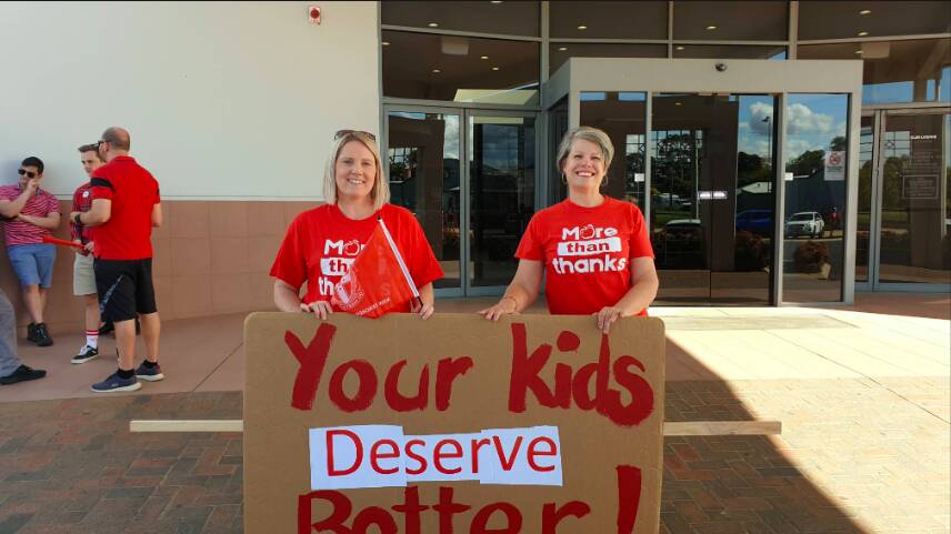 Griffith Teacher's Association president Jenna Woodland and secretary Susan Forner at a 2022 strike. Picture by Cai Holroyd