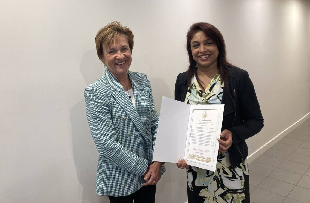 ONCOLOGIST: Helen Dalton MP and Dr Renuka Chittajallu with her Community Recognition Statement. PHOTO: Cai Holroyd