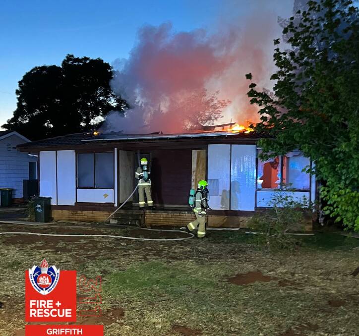 ABLAZE: A vacant house on Snaith Place went up in flames in the early hours of Sunday morning. PHOTO: Fire and Rescue NSW