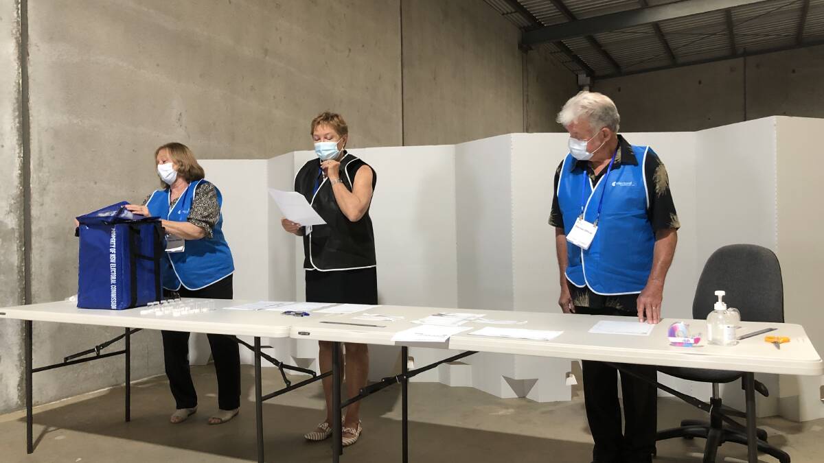 ELECTION OFFICIALS: Carol Taylor, Jane Moxon and Brian Edwards volunteered to draw the ballot as election officials. PHOTO: Cai Holroyd