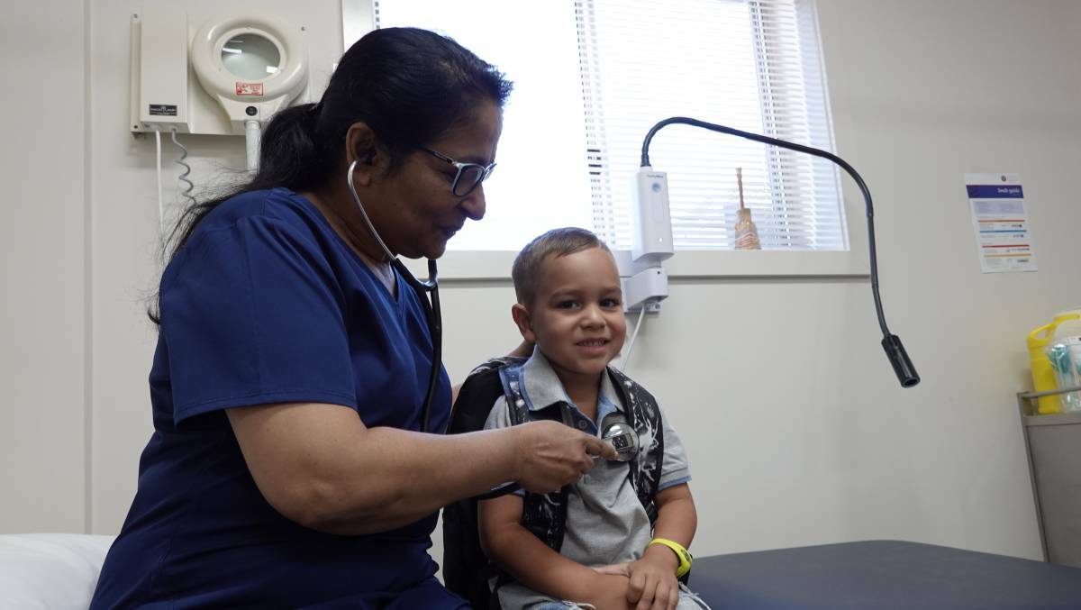 CHECK-UP: Dextan Williams is seen by Dr Yalini Thevashangar at Griffith Aboriginal Medical Service. PHOTO: Monty Jacka