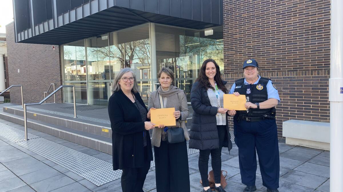 DONATION: Registrar Virgina Scanlon, Centacare's Jo Polkinghorne, Headspace's Emma Rendell and Senior Sergeant Michelle Cheers outside the courthouse. PHOTO: Cai Holroyd