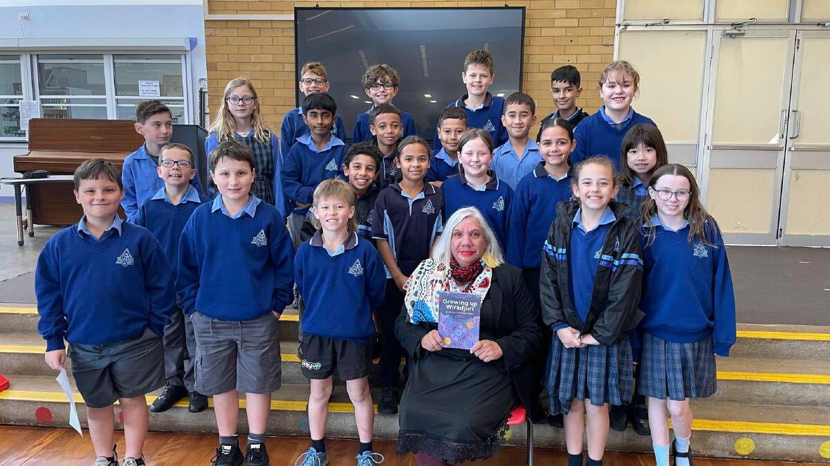 Aunty Cheryl Penrith with the students from Griffith East Public School. Photo contributed.