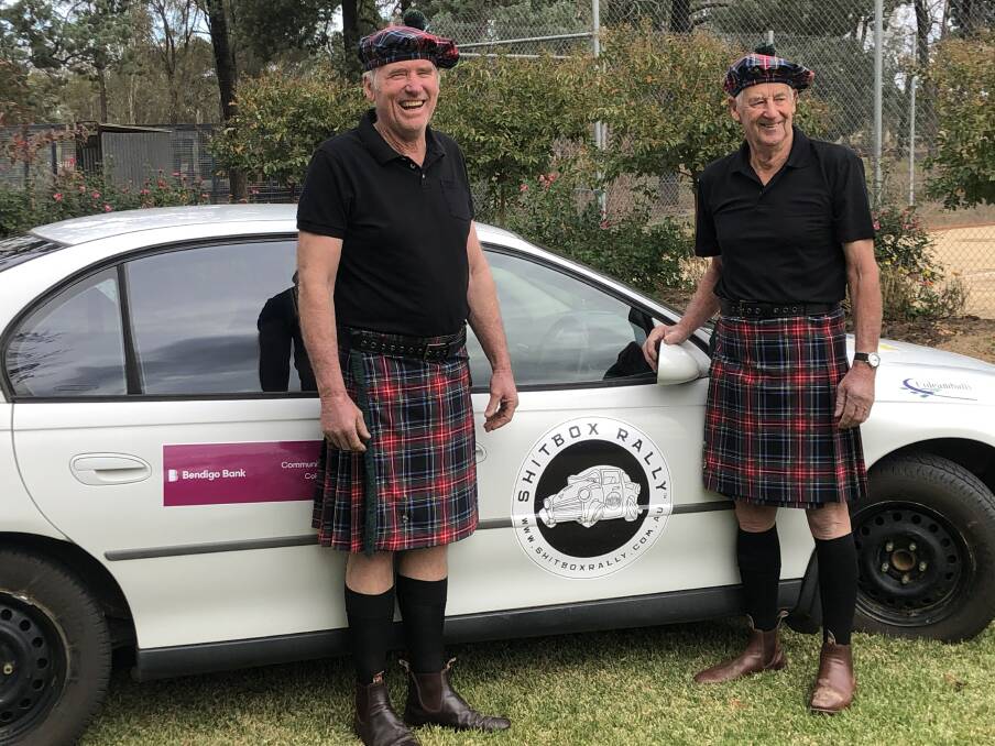 VIEW TO A KILT: Andrew Jackson Snr and Keith Burge are on their way to Alice Springs to participate in the annual "Shitbox Rally" PHOTO: Contributed