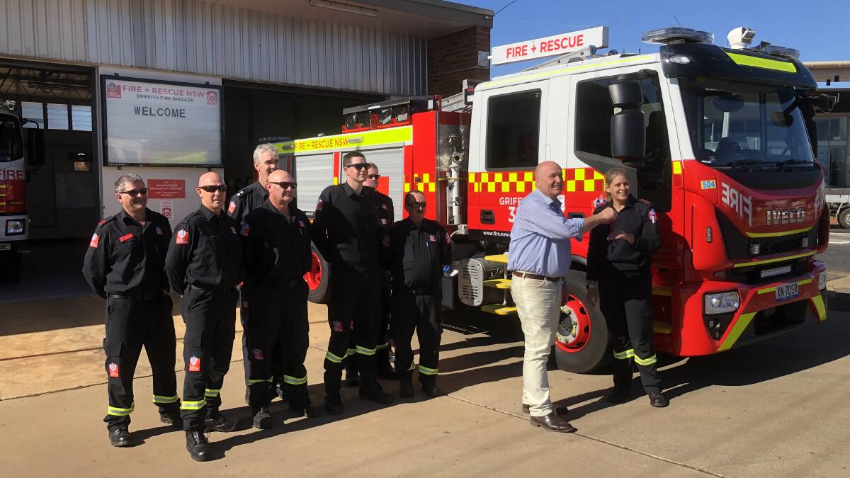 TRUCK IT: Minister for emergency services David Elliott handed over the keys to Captain Danielle McKay. PHOTO: Cai Holroyd