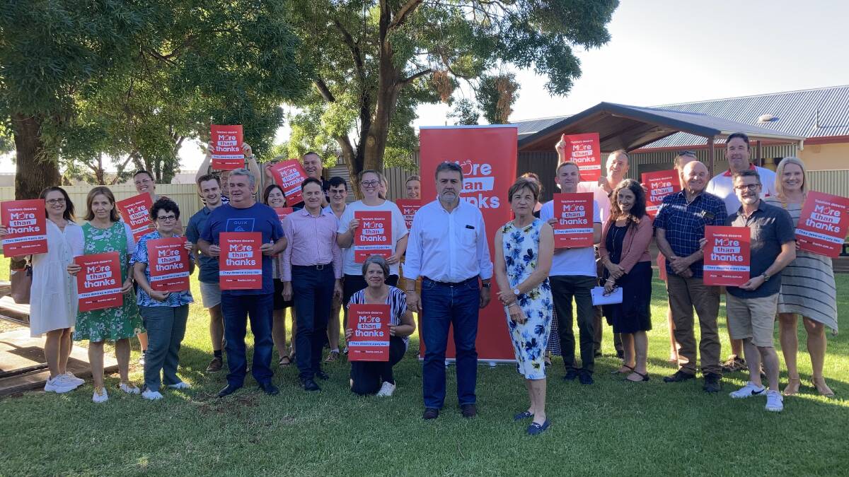 MORE THAN THANKS: Angelo Gavrielatos, MP Helen Dalton and just some of Griffith's hard-working teachers staring down the teaching crisis. PHOTO: Cai Holroyd