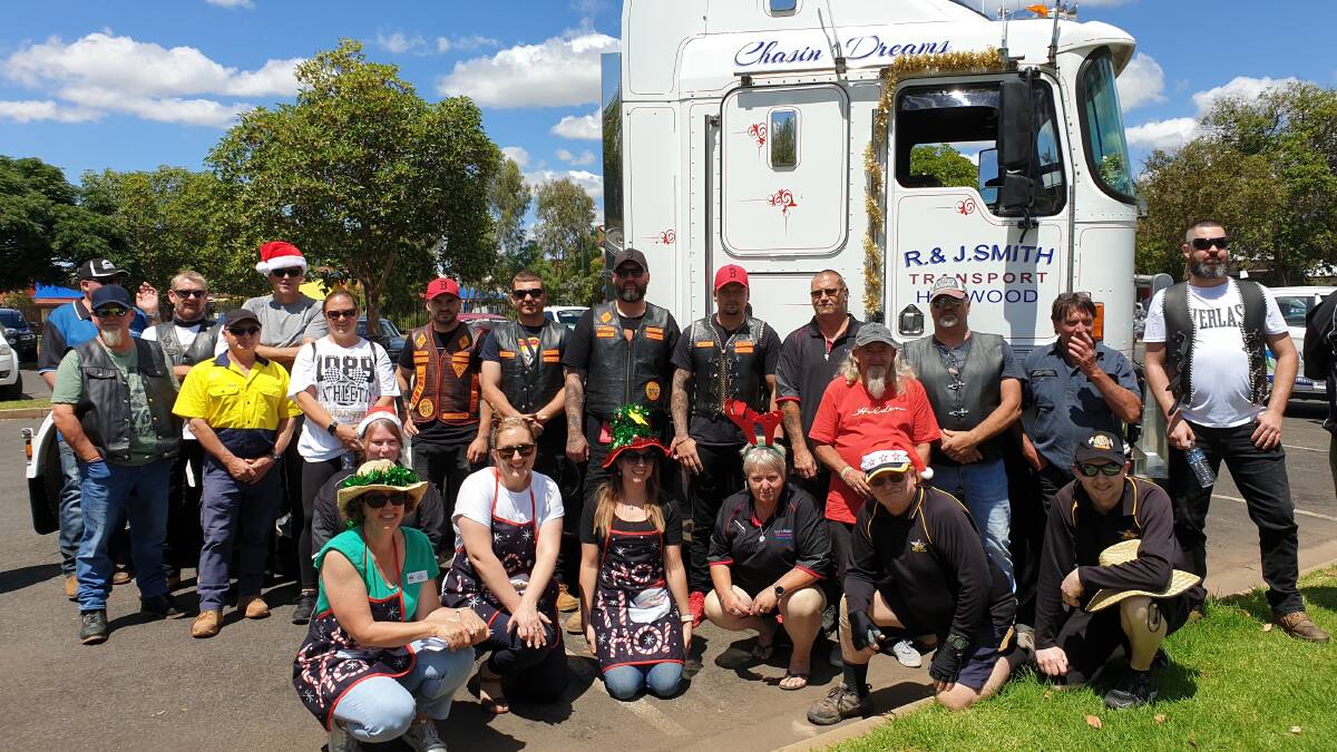 GROUP PHOTO: Meals on Wheels Griffith, R and J transport and a crowd of volunteers gathered at the visitor's centre carpark to collect donations before heading off to Goolgowi. PHOTO: Cai Holroyd