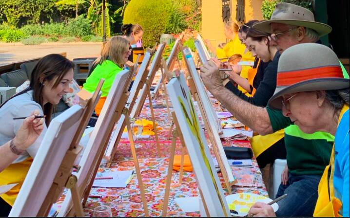 ARTISTS AT WORK: Isis Ronan's 'Paint and Sips' have proven wildly popular, making it a sure boost to Hanwood's funds. PHOTO: Contributed
