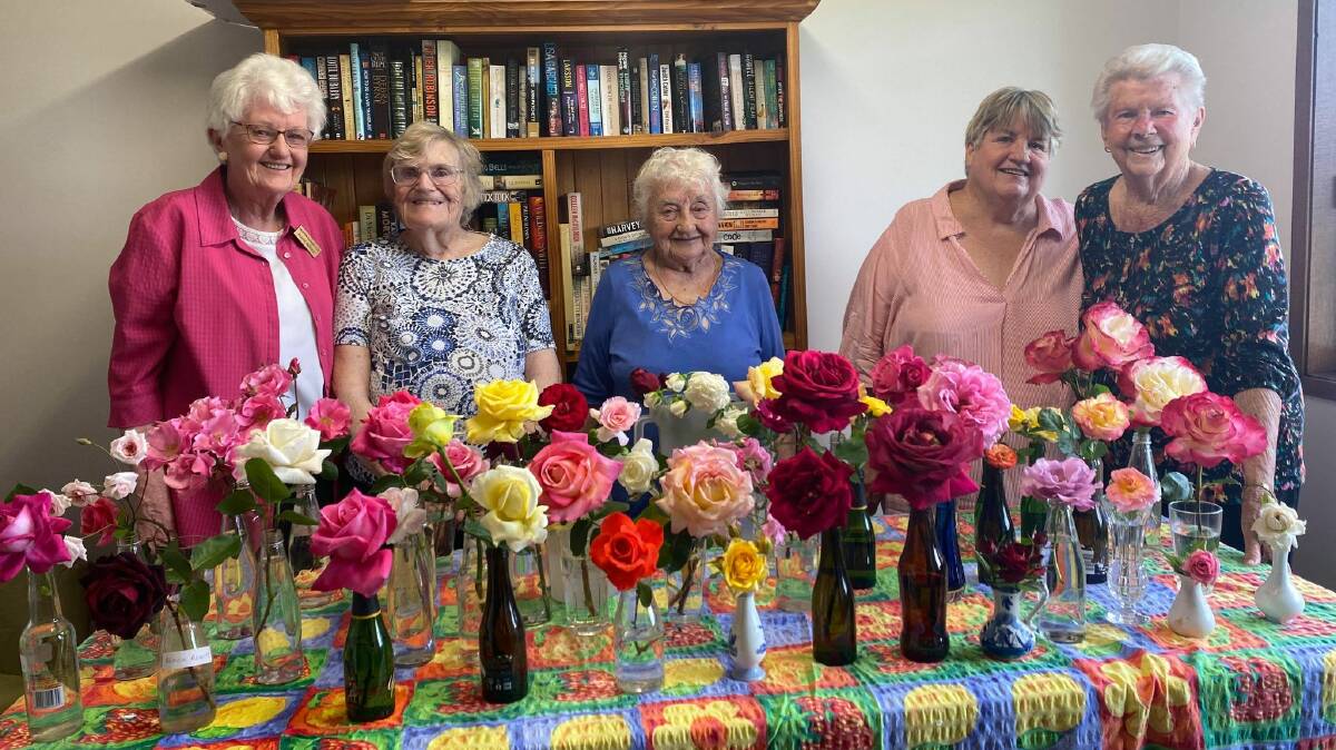 BEAUTY BEYOND COMPARE: Griffith Gardening Club members proudly showcase a variety of roses that they have lovingly grown. PHOTO: Lizzie Gracie