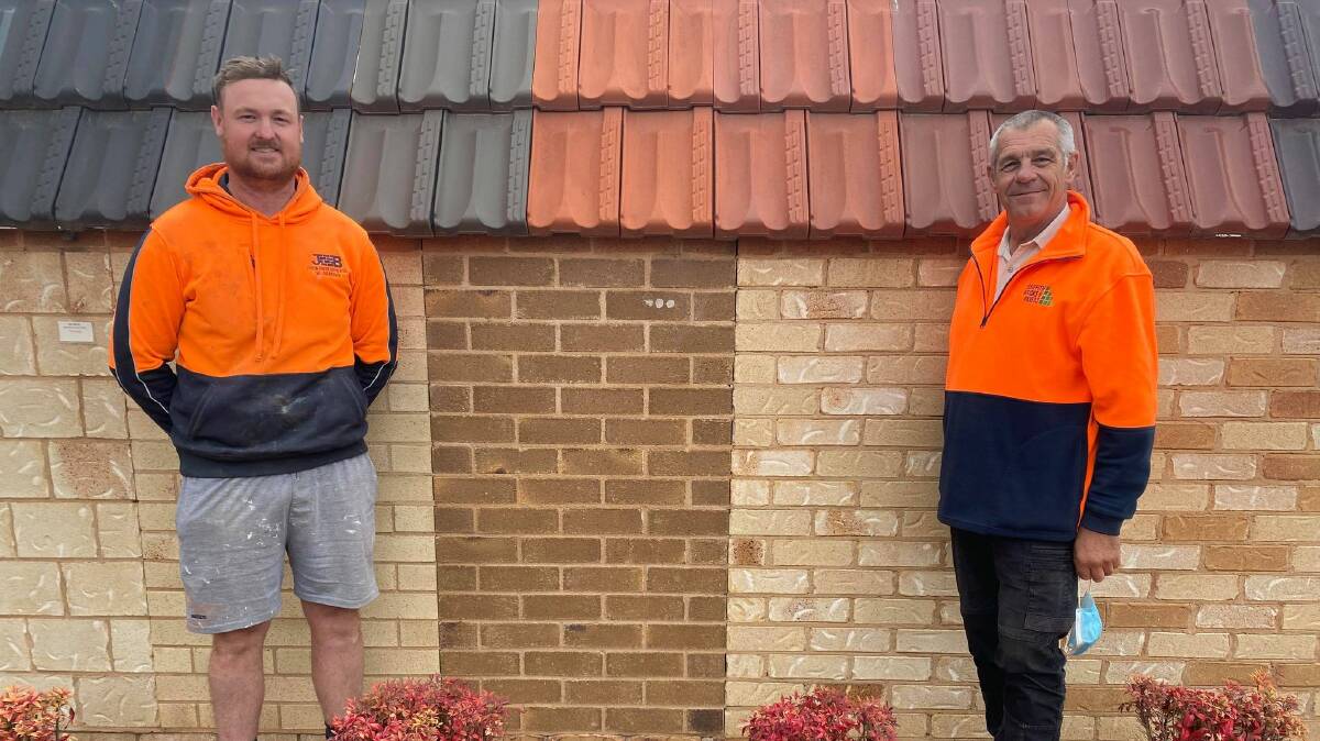 READY FOR A NEW GENERATION OF WORKERS: Jordon Burley and Robert Vardanega both encourage young community members to pick up a bricklaying apprenticeship, Australia's most in demand trade. PHOTO: Lizzie Gracie