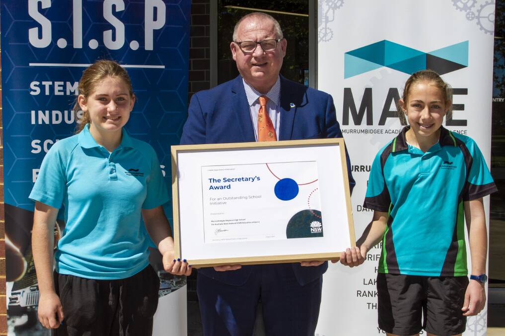 DESERVING RECIPIENTS: Year 7 student Emerson Brown alongside MRHS Executive Principal David Crelley and fellow Year 7 student Emma King. PHOTO: Shane Ronan 