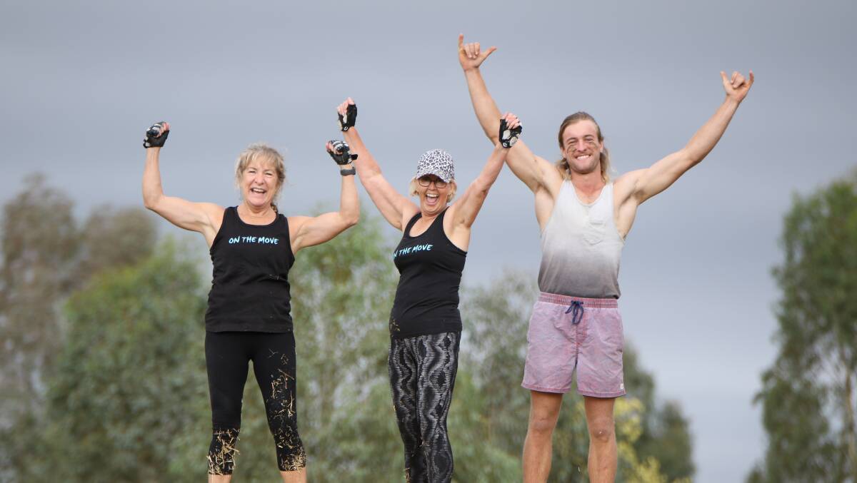 A TEAM EFFORT: Participants of the Farmers Active Games held in Temora in previous years are all smiles after completing the course. PHOTO: Supplied