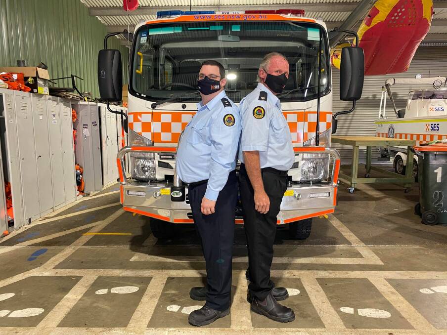A NEW ERA: Incoming Unit Commander Tim Laidler poses alongside outgoing Commander of 22 years, Steve Mortlock in front of a SES Rescue Vehicle. PHOTO: Lizzie Gracie