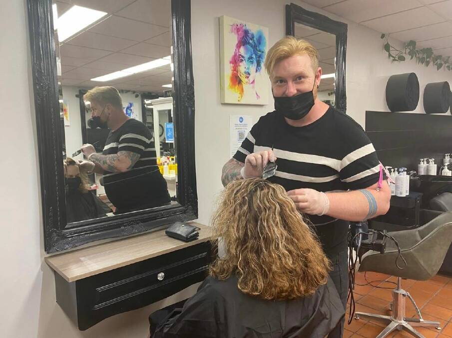 UNDER PRESSURE: Fox and Co Owner and Hairdresser Richard Brewer said the change put even more pressure on businesses trying to make ends meet. PHOTO: Lizzie Gracie